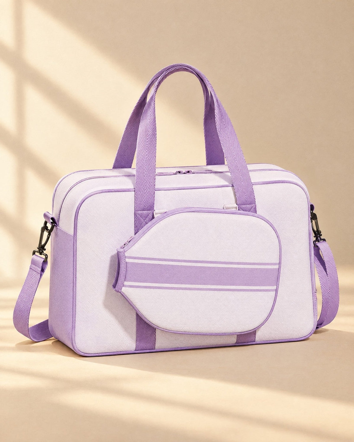 The Condesa Tote in cream with purple trim and its paddle-shaped cover